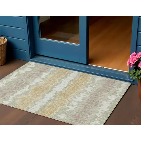 Artichoke Green Ivory And Gold Striped Washable Indoor Outdoor Area Rug Photo 1