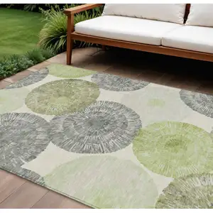 Photo of Artichoke Green Ivory And Gray Abstract Washable Indoor Outdoor Area Rug