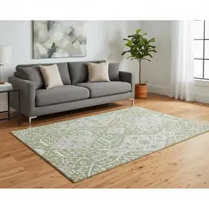 Photo of Artichoke Green Ivory And Gray Floral Washable Area Rug With UV Protection
