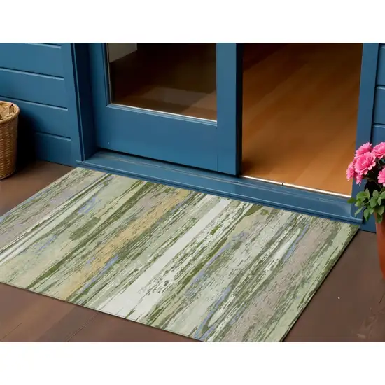 Artichoke Green Ivory And Tan Striped Washable Indoor Outdoor Area Rug Photo 1