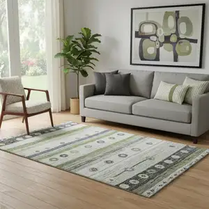 Photo of Artichoke Green Purple And Ivory Striped Washable Area Rug With UV Protection