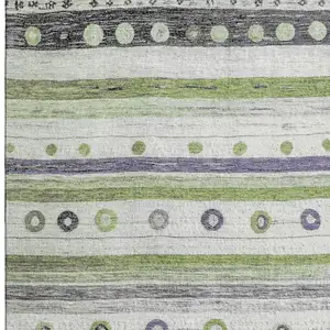 Photo of Artichoke Green Purple And Ivory Striped Washable Area Rug With UV Protection