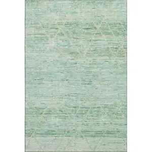 Photo of Artichoke Green Teal And Ivory Abstract Geometric Washable Area Rug With UV Protection