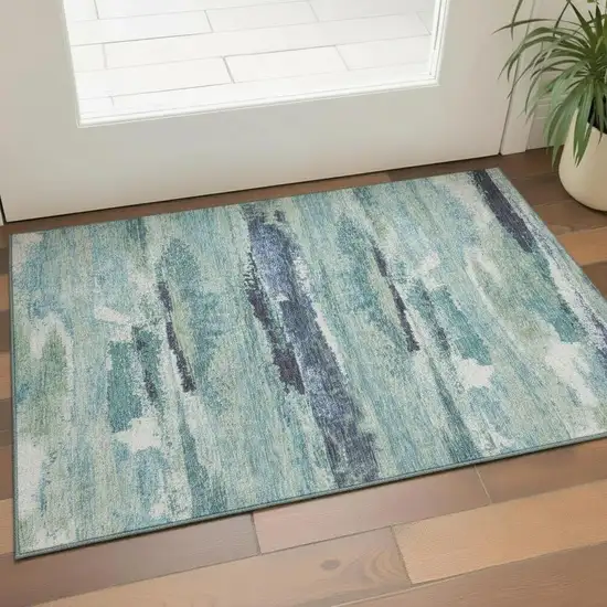 Artichoke Green Teal And Ivory Abstract Washable Area Rug With UV Protection Photo 1