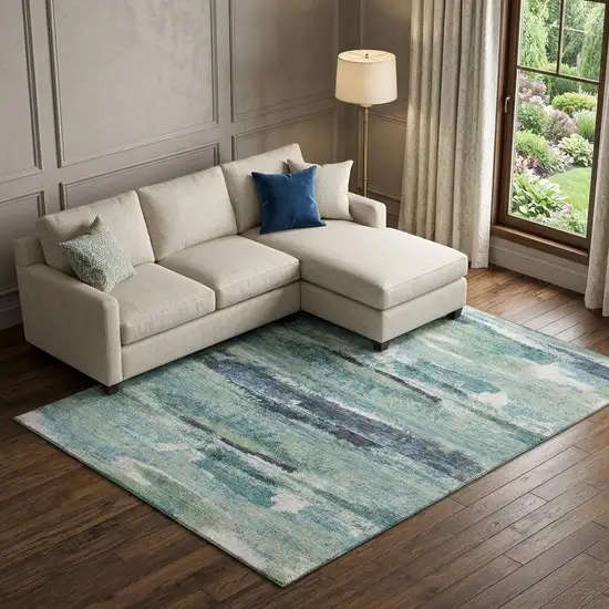 Artichoke Green Teal And Ivory Abstract Washable Area Rug With UV Protection Photo 1