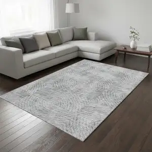 Photo of Ash Gray And Charcoal Geometric Washable Area Rug With UV Protection