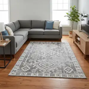 Photo of Ash Gray And Ivory Geometric Washable Area Rug With UV Protection