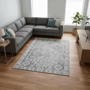 Photo of Ash Gray And Ivory Geometric Washable Area Rug With UV Protection