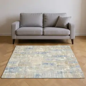 Photo of Beige Abstract Power Loom Area Rug