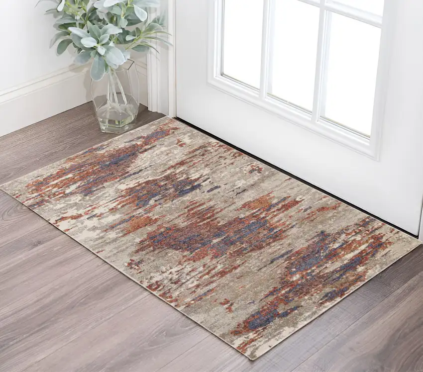 Beige Rust and Blue Abstract Power Loom Area Rug Photo 1