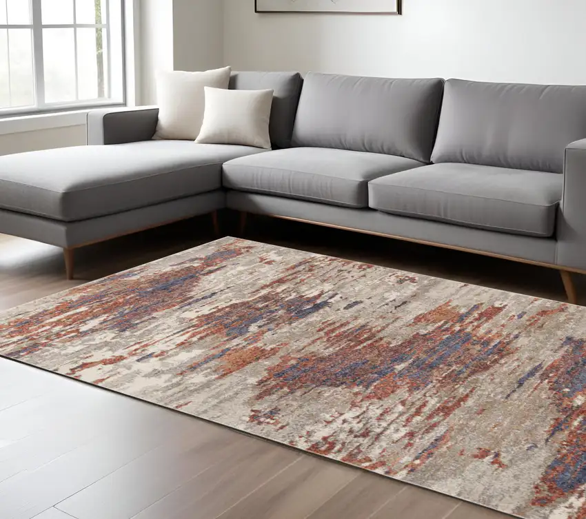 Beige Rust and Blue Abstract Power Loom Area Rug Photo 1