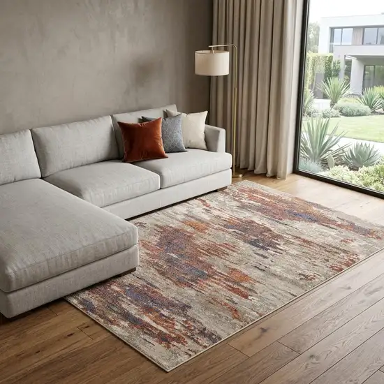 Beige Rust And Blue Abstract Area Rug Photo 1