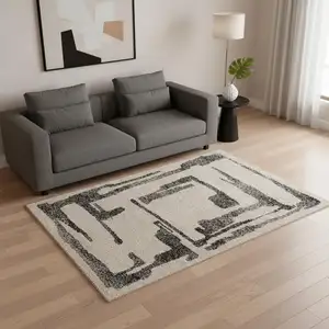 Photo of Beige And Black Abstract Area Rug