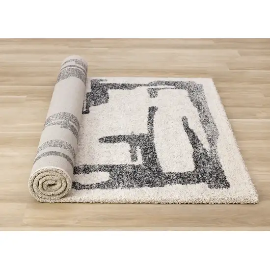 Beige And Black Abstract Area Rug Photo 9