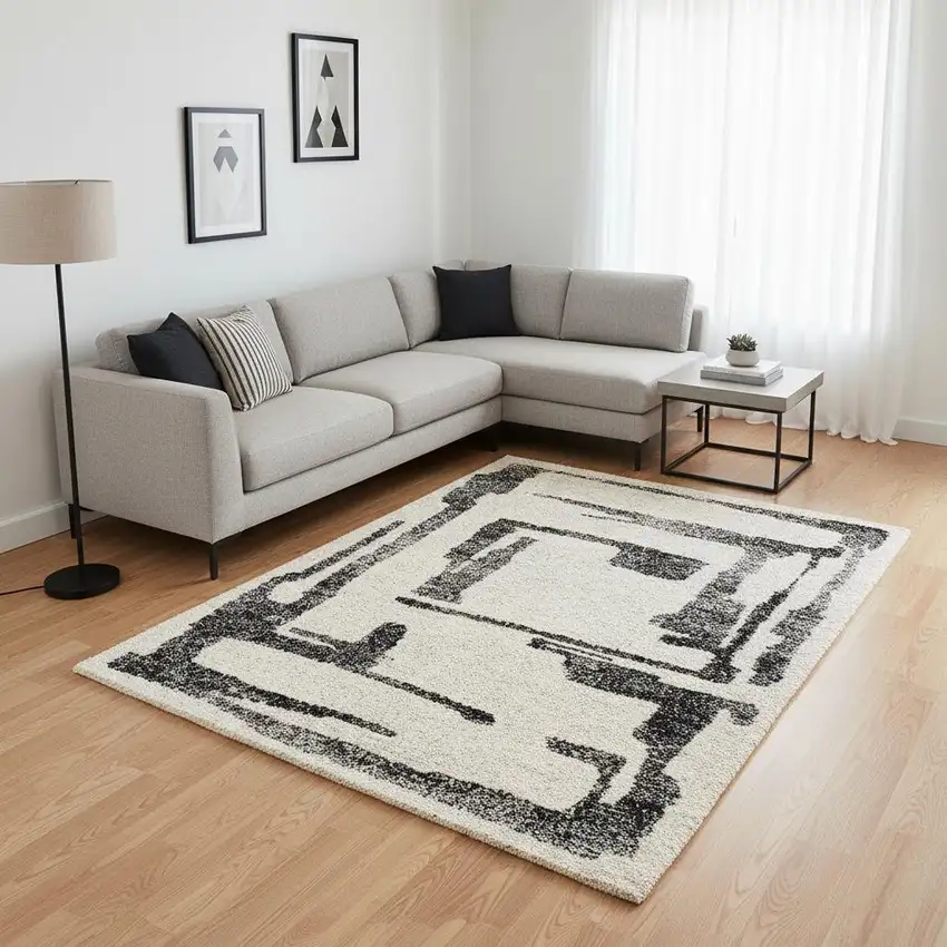 Beige And Black Abstract Area Rug Photo 1