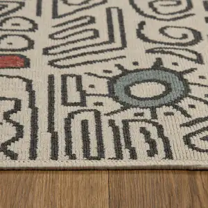 Photo of Beige And Black Abstract Area Rug