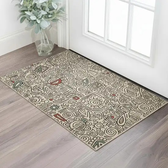 Beige And Black Abstract Area Rug Photo 1