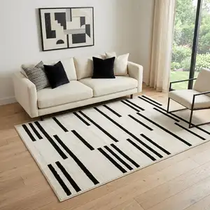 Photo of Beige And Black Abstract Area Rug