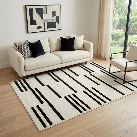 Beige And Black Abstract Area Rug Photo 1