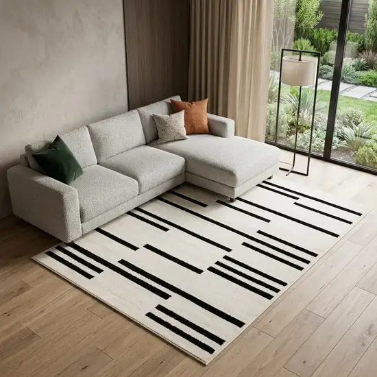 Beige And Black Abstract Area Rug Photo 1
