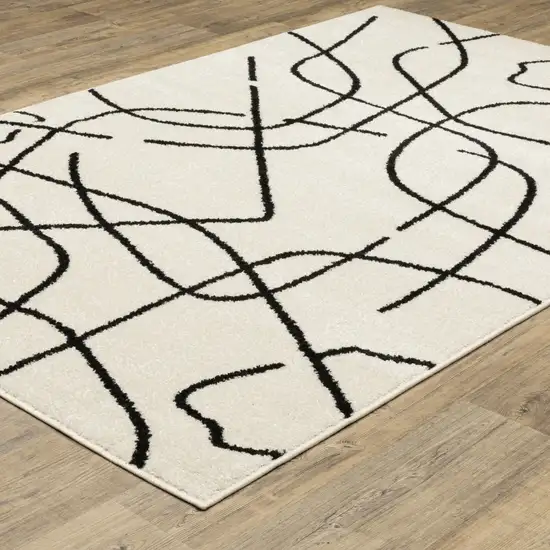 Beige And Black Abstract Area Rug Photo 3