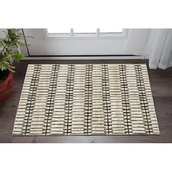 Beige And Black Geometric Area Rug Photo 1