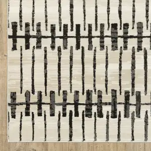 Photo of Beige And Black Geometric Area Rug