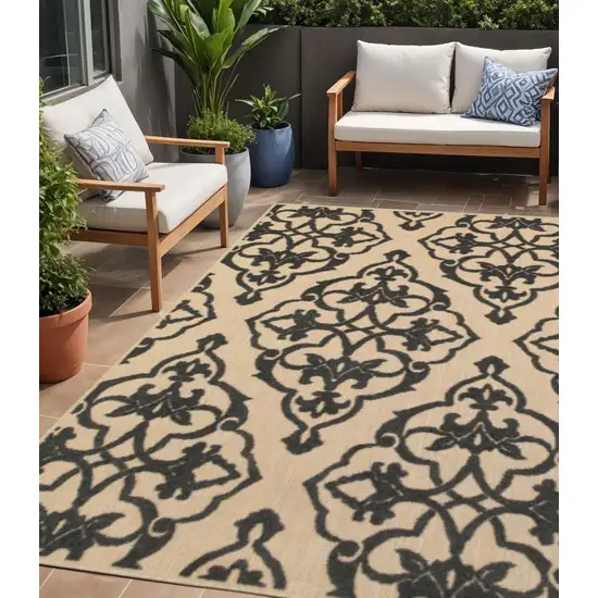 Beige and Black Medallion Stain Resistant Indoor Outdoor Area Rug Photo 1