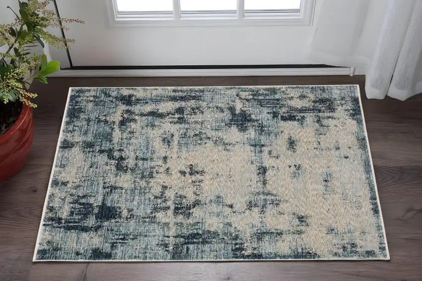 Beige And Blue Abstract Area Rug With Fringe Photo 1