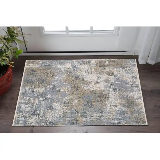 Beige And Blue Abstract Area Rug With Fringe Photo 1