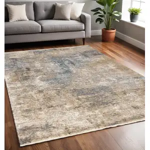 Photo of Beige And Blue Abstract Area Rug