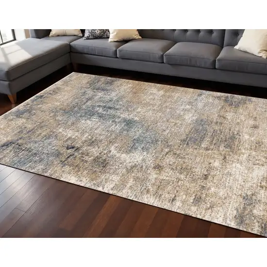 Beige And Blue Abstract Area Rug Photo 1