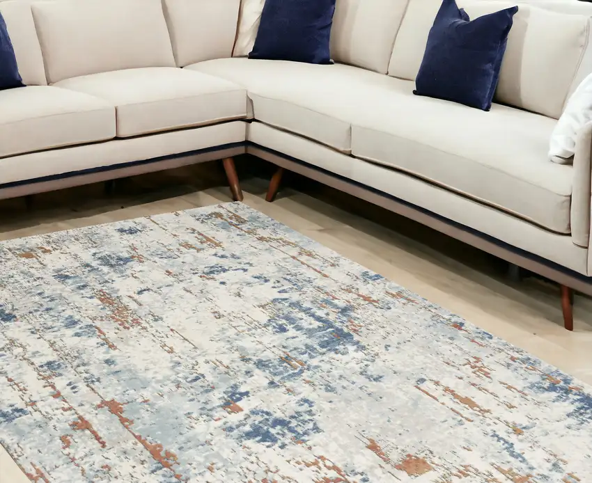 Beige And Blue Abstract Area Rug Photo 1