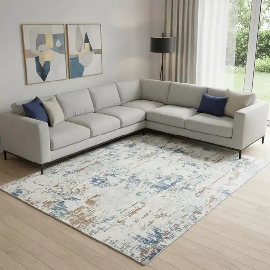 Beige And Blue Abstract Area Rug Photo 1