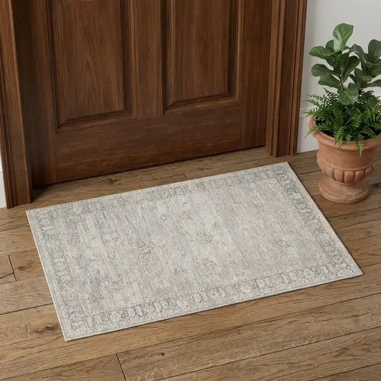 Beige And Blue Abstract Area Rug Photo 1