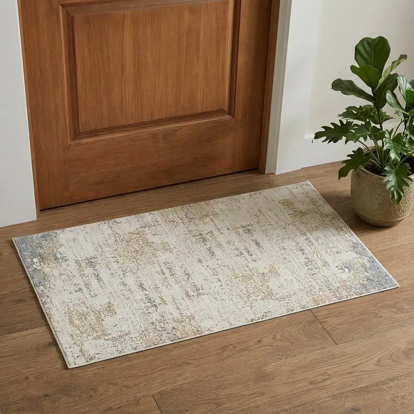 Beige And Blue Abstract Area Rug Photo 1