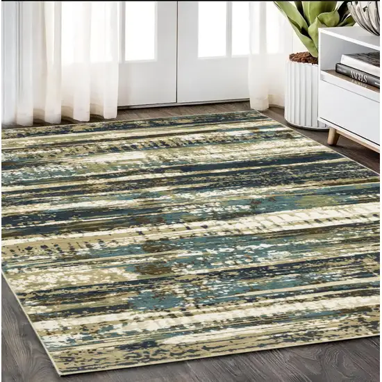 Beige And Blue Abstract Area Rug Photo 1