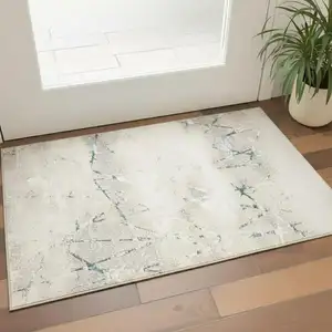 Photo of Beige And Blue Abstract Distressed Area Rug