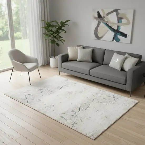 Beige And Blue Abstract Distressed Area Rug Photo 1