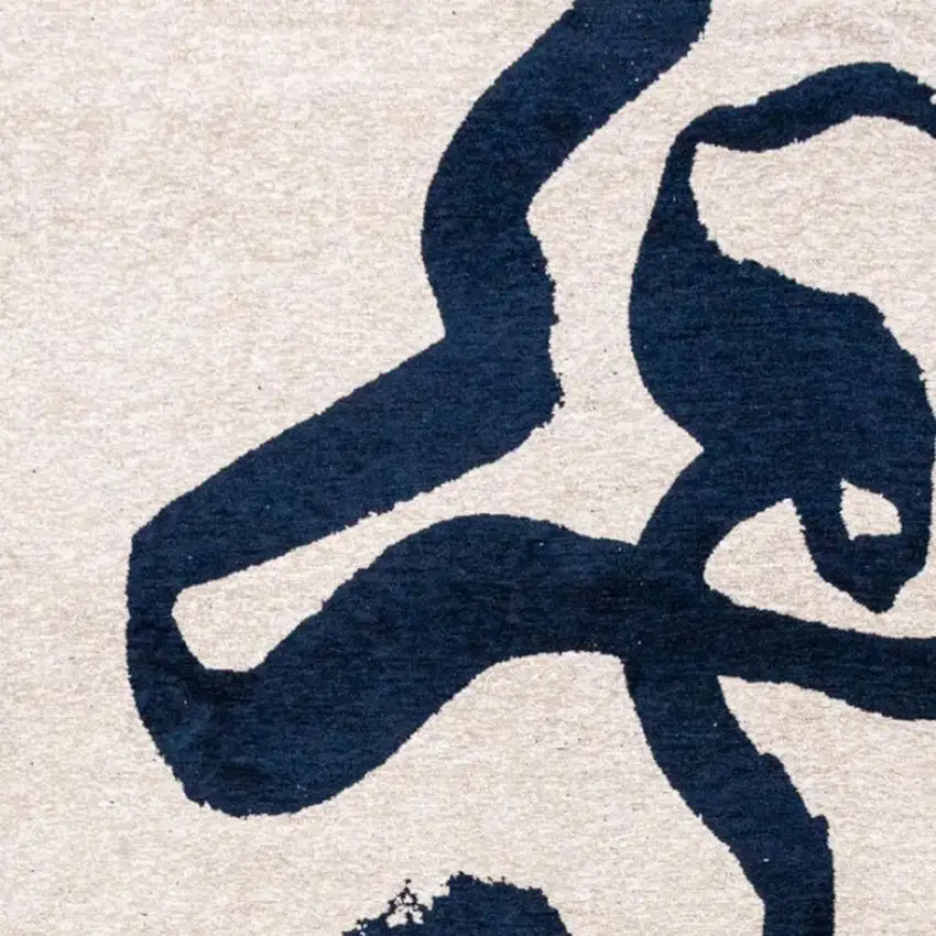 Beige And Blue Abstract Washable Area Rug With UV Protection Photo 3