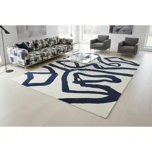 Photo of Beige And Blue Abstract Washable Area Rug With UV Protection