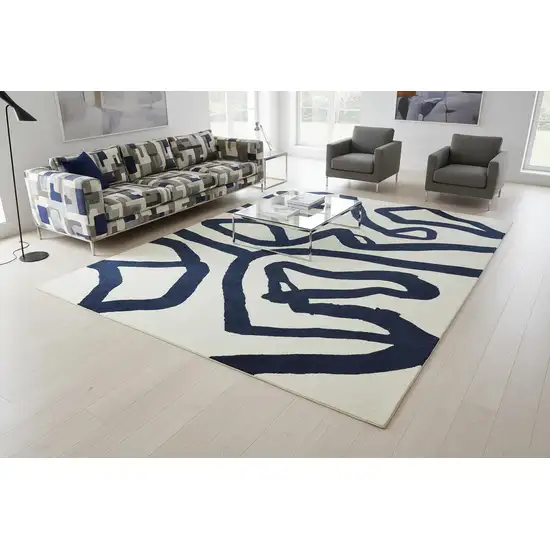 Beige And Blue Abstract Washable Area Rug With UV Protection Photo 1