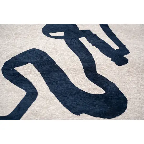 Beige And Blue Abstract Washable Area Rug With UV Protection Photo 6