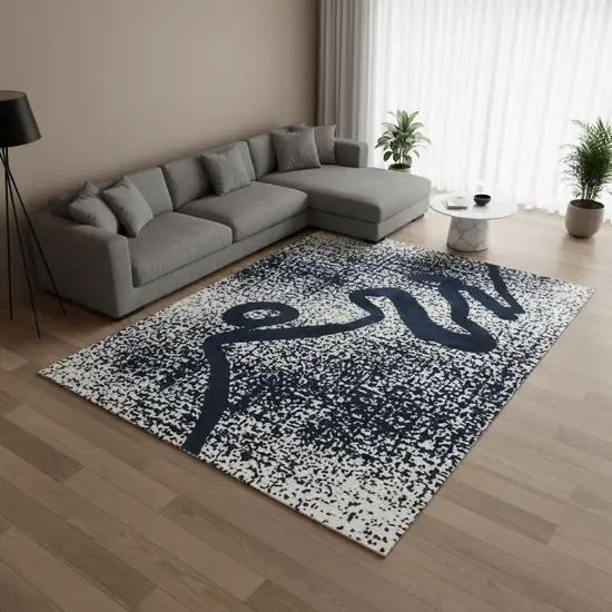 Beige And Blue Abstract Washable Area Rug With UV Protection Photo 1