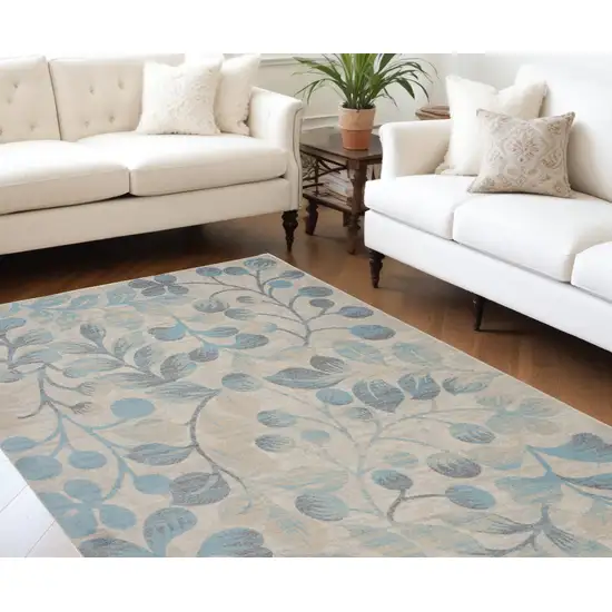 Beige And Blue Floral Area Rug Photo 1