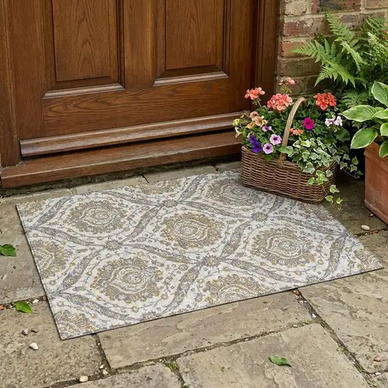 Beige And Blue Floral Washable Indoor Outdoor Area Rug Photo 1