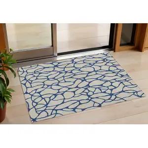 Photo of Beige And Blue Geometric Washable Indoor Outdoor Area Rug