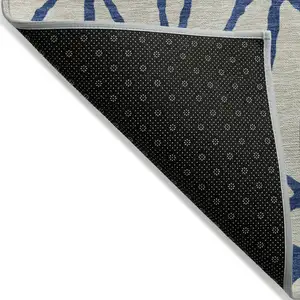 Photo of Beige And Blue Geometric Washable Indoor Outdoor Area Rug