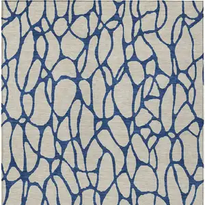 Photo of Beige And Blue Geometric Washable Indoor Outdoor Area Rug