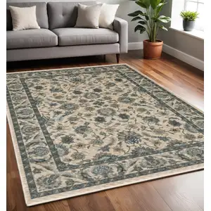 Photo of Beige And Blue Oriental Area Rug With Fringe